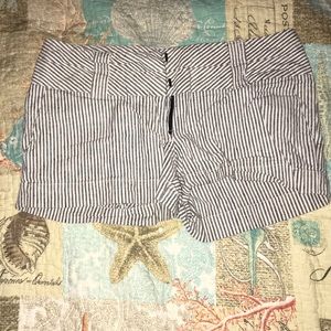 Grey and white striped shorts.